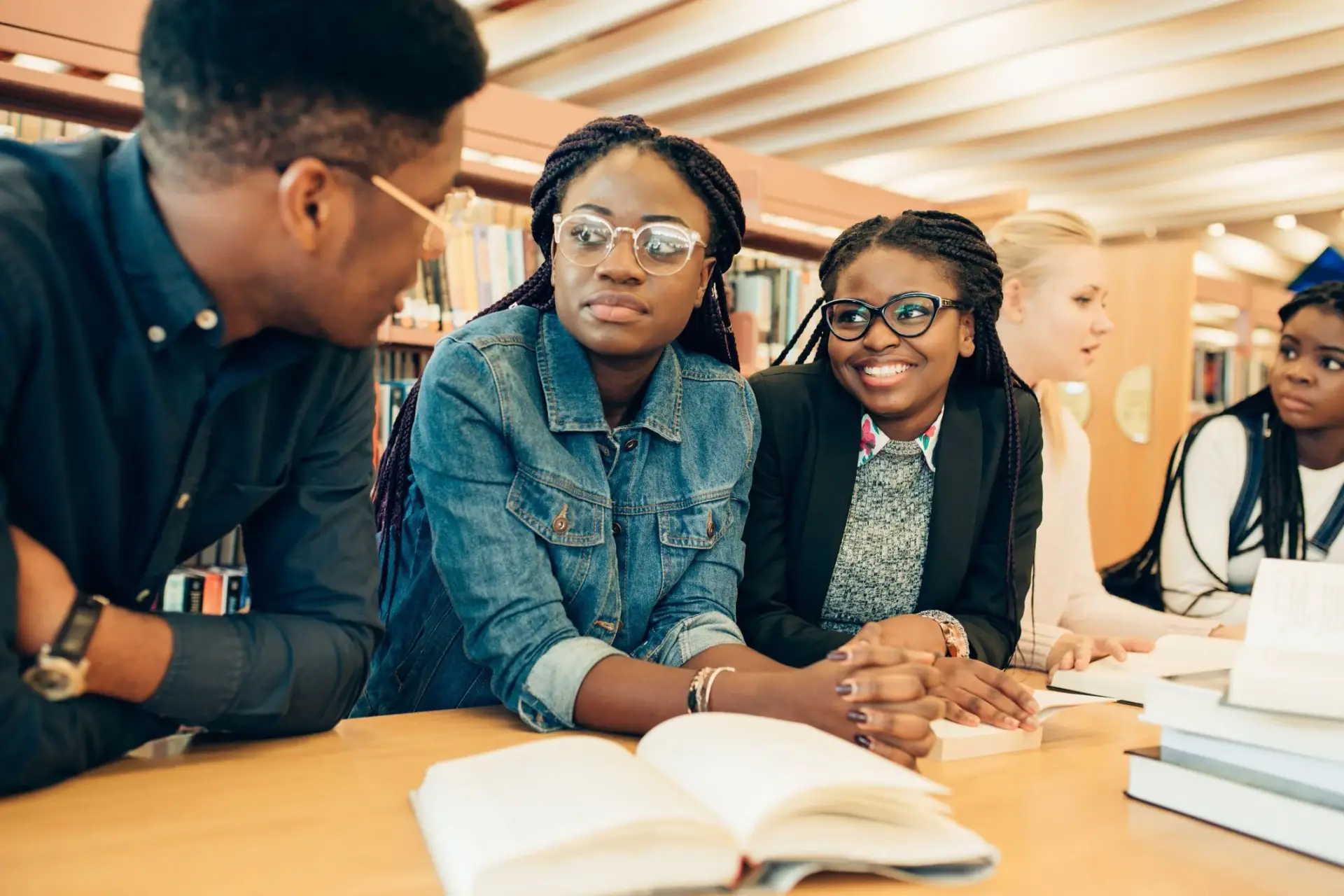 Students studying together at a library table